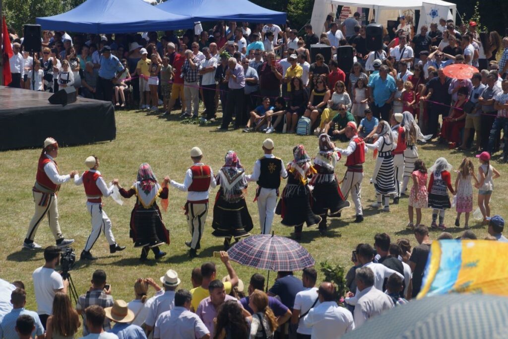 Women in traditional highland costumes performing a dance at the Logu i Bjeshkëve festival in Northern Albania.