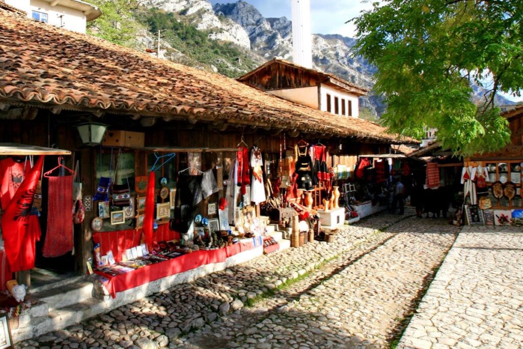 Visitors learning traditional weaving techniques in a workshop in Krujë, Albania.