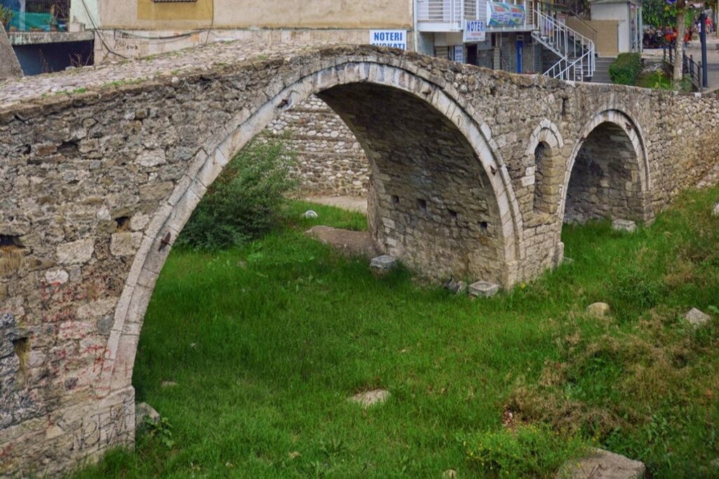 The historic Tamara Bridge over the turquoise Cemi River in the heart of North Albania.