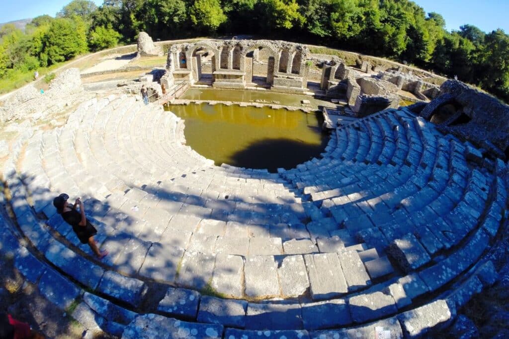 The amphitheater and basilica ruins at Butrint National Park, a UNESCO World Heritage Site in Albania.