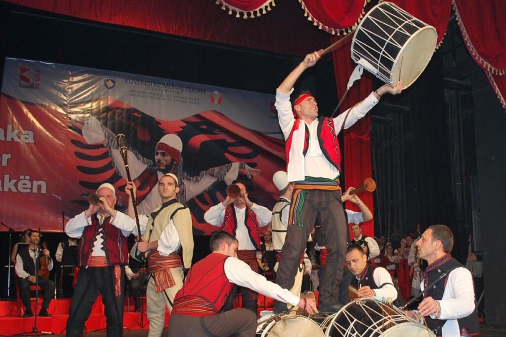 Traditional dancers performing at the National Folklore Festival in Gjirokastër, Albania.