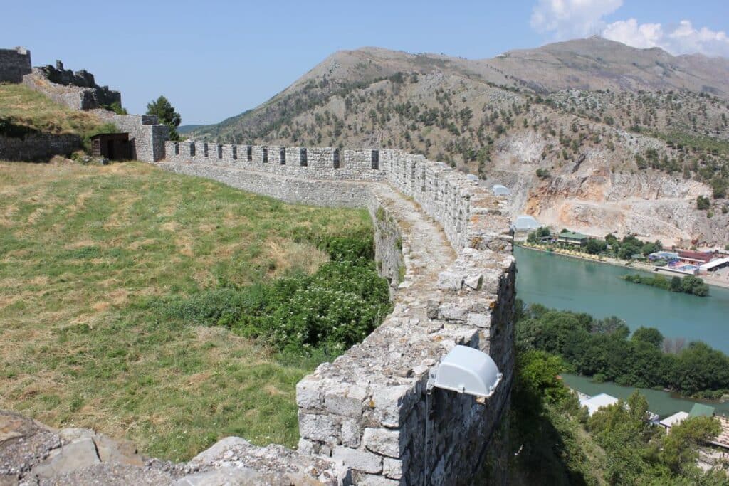 Rozafa Castle perched on a hill, offering panoramic views of Shkodër’s rivers and mountains.