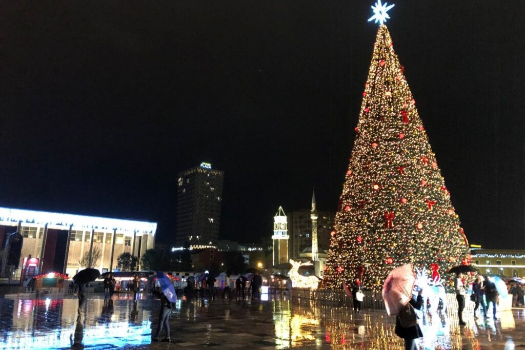 Christmas and New Year celebrations in Albania’s Skanderbeg Square with a Christmas tree and festive lights.