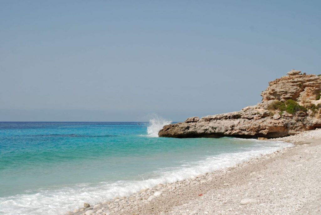 Albania’s summer coast with turquoise waters and cliffs, ideal for beach lovers.