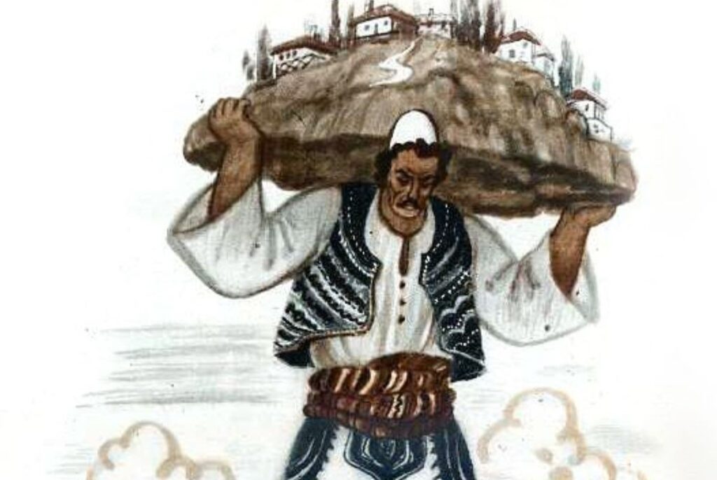 Albanian folk hero in traditional attire carrying a massive boulder